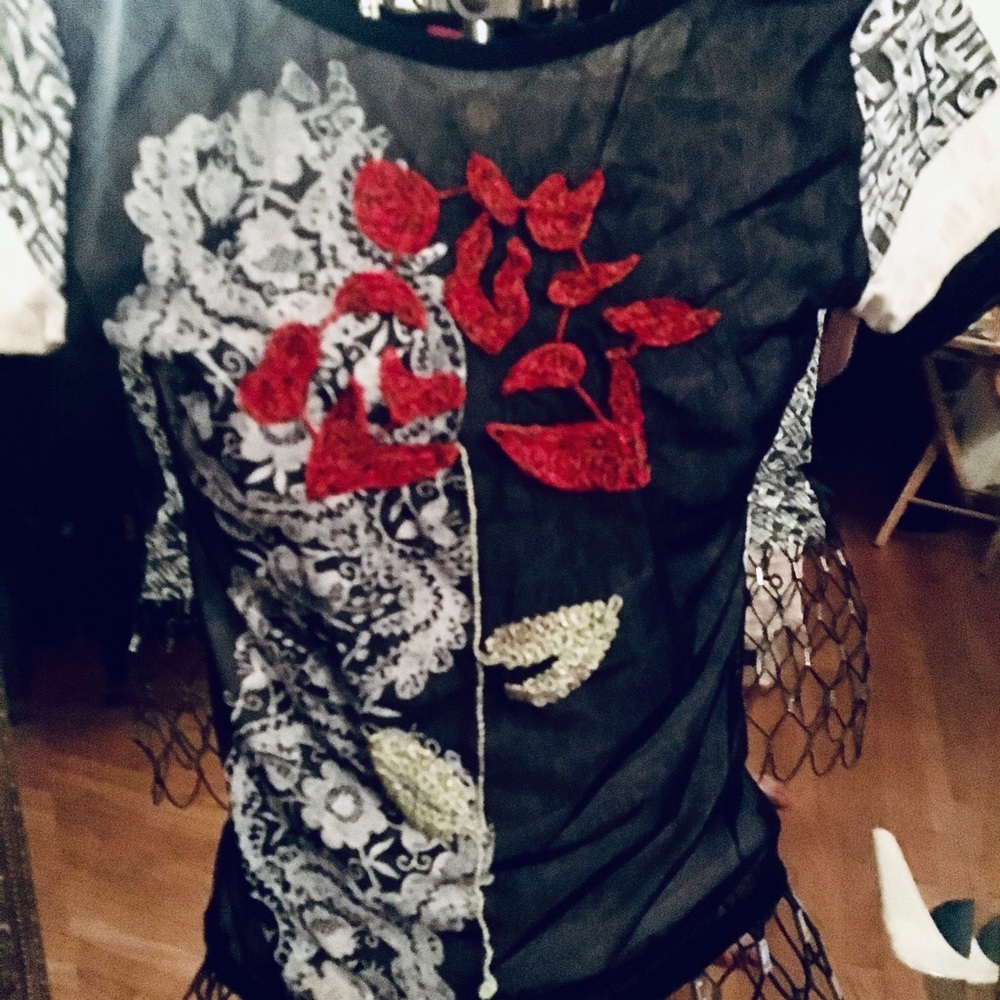 Embroidered top.